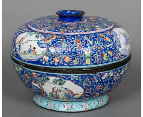 A 19th/20th century Chinese canton enamel box and coverOf circular form, decorated with figural vignettes in floral strapwork