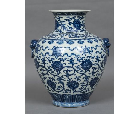 A Chinese blue and white porcelain baluster vaseDecorated with lotus strapwork, blue painted six character Qianlong seal mark