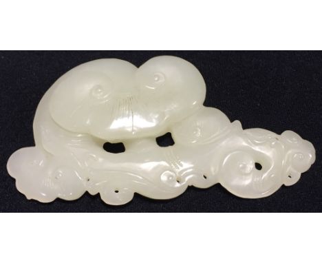 A celadon jade carving of Lingzhi10 cm long. CONDITION REPORTS: Generally in good condition, expected wear.