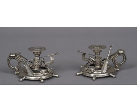 A pair of Continental silver chamber sticks, both with 800 purity mark and maker's mark of GDBoth mounted with oars, anchor a