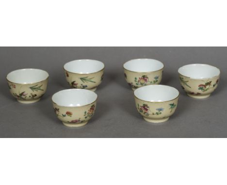 A set of six 19th century Chinese porcelain tea bowlsEach decorated with various insects and frogs amongst floral sprays, the