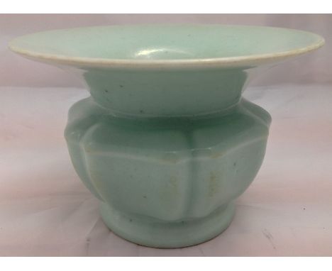 A Chinese porcelain celadon glazed ZhadouThe flared rim above a lobed body, standing on a shallow spreading foot, blued paint