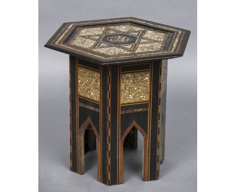A late 19th/early 20th century Liberty type Islamic style coffee tableOf typical form, the hexagonal top with mother-of-pearl