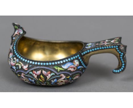 A Russian champleve enamelled silver gilt kovsh with 84 Zolotnik mark and maker's mark of Mikhail Fyodorovich SokolovOf typic