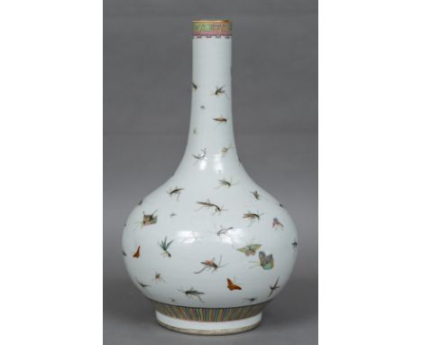 A Chinese porcelain vaseOf baluster form, decorated with various insects, red painted six character Jiaqing seal mark to base