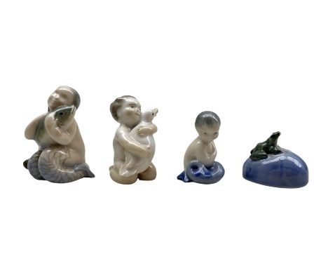 Four Royal Copenhagen porcelain figures comprising a Mermaid holding a Fish no. 2348, Girl holding Duck no. 2332 and Mermaid 