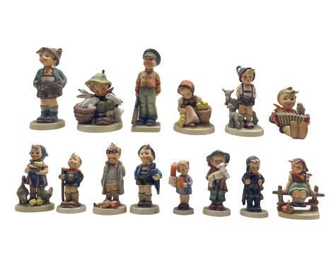 Fourteen Hummel figures including Soldier Boy no. 332, Doctor no. 127 and others (14)