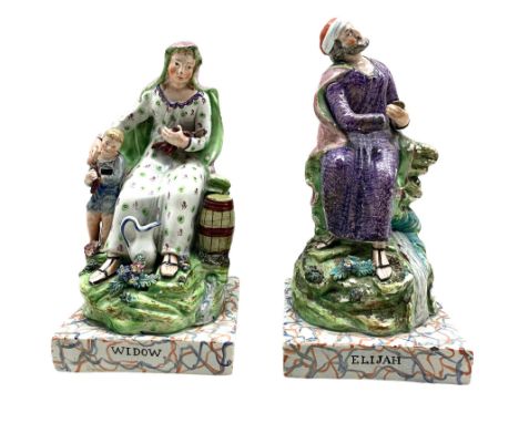 Pair of early 19th century Staffordshire Pearlware figures of 'Elijah' and 'Widow', on square marbled bases H24cm