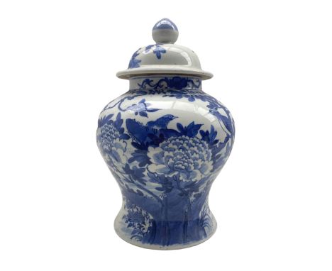 Late 19th/ early 20th century Chinese blue and white vase and cover of inverted baluster form, painted with exotic birds and 