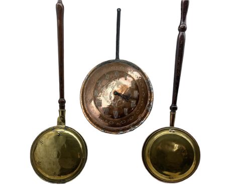 19th/ early 20th century copper pan later converted into a clock with repousse numerals and engraved fish decoration to the c