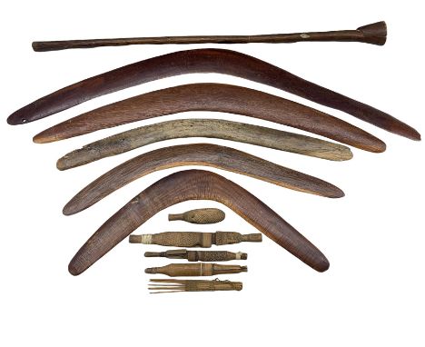 Three Australian Aboriginal boomerangs with ridged decoration, two others, African knives, powder flask etc