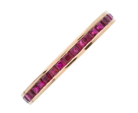 An 18ct gold calibre-cut ruby full eternity ring, estimated total ruby weight 0.90ct, hallmarks for Birmingham, ring size M1/