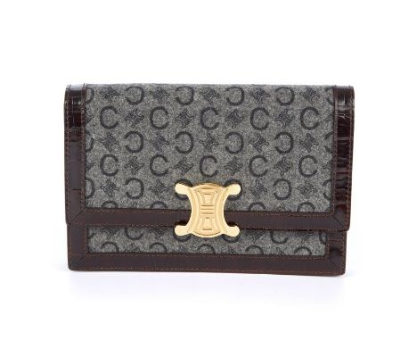 Celine, a Triomphe clutch, designed with a grey wool felt exterior, featuring the maker's logo throughout and crocodile embos