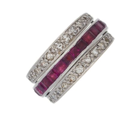 An Art Deco platinum, calibre-cut ruby and sapphire full eternity swivel ring, with single-cut diamond hinged sides, estimate