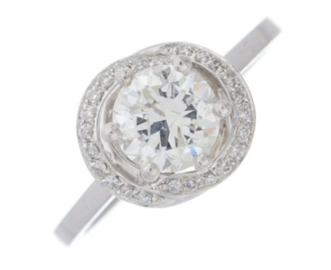 A platinum brilliant-cut diamond single-stone ring, with similarly-cut diamond surround, principal diamond estimated weight 1