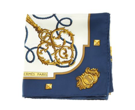 Hermes, a Les Cles silk scarf, depicting a variety of different gold keys strung together with rope and tassels on a white ba
