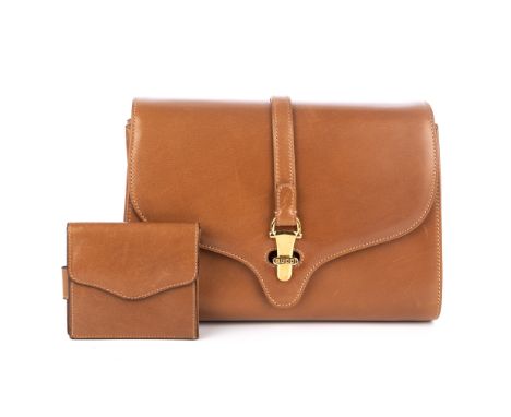 Gucci, a vintage smooth leather handbag with matching purse, featuring polished gold-tone hardware, detachable thin leather s