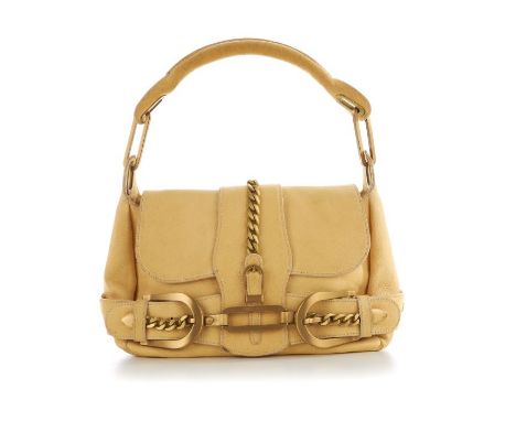 Jimmy Choo, a cream leather Tulita handbag, featuring brushed gold-tone hardware to include chain and buckle details, with a 