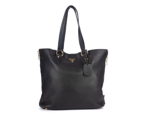 Prada, a Vitello Daino Side Zip Convertible tote, crafted from black leather with gold-tone hardware, featuring dual rolled l
