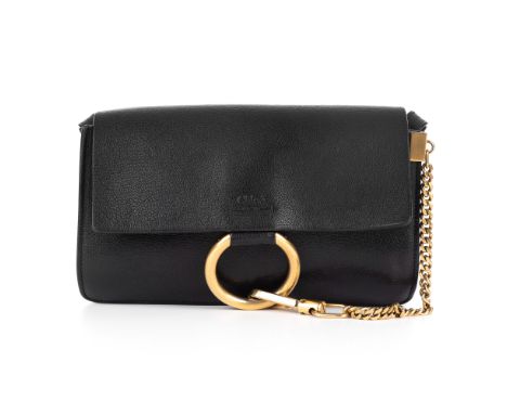 Chloe, a small black leather Faye handbag, featuring a front flap with magnetic snap button fastening, gold-tone ring and cha