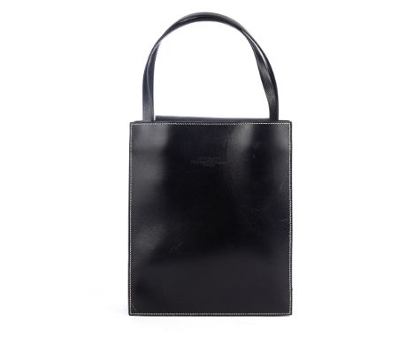 Hermes, a 1999 Lucy MM tote, crafted from lightly grained black leather with contrasting white stitching, featuring dual leat