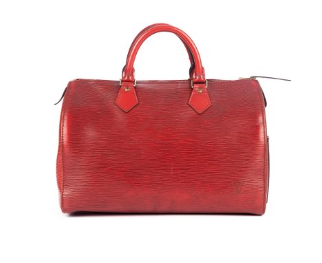 Louis Vuitton, a red epi Speedy 30 handbag, designed with a textured red epi leather exterior and smooth leather trim, double