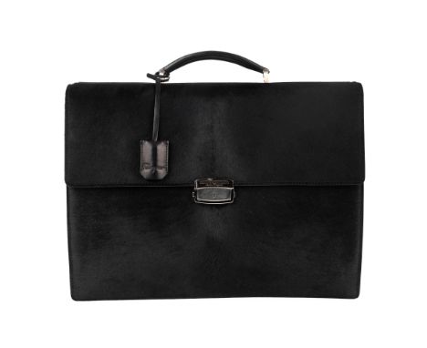 Salvatore Ferragamo, a large black pony hair briefcase, designed with smooth black leather trim, single leather top handle an