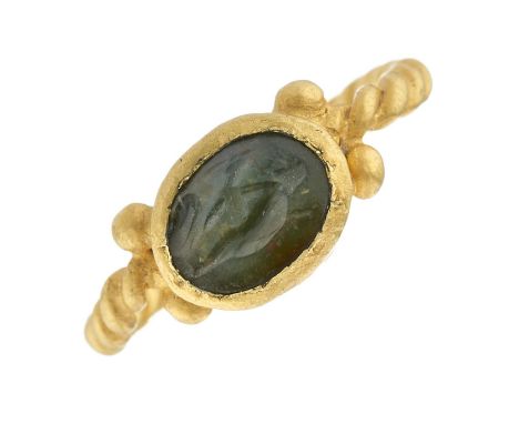 An antique late Roman gold, green chalcedony intaglio cabochon ring, with copy of a preliminary report by J. David Zienkiewic