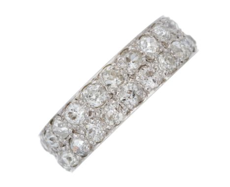 An 18ct gold old-cut diamond two-row half eternity ring, with tapered band, estimated total diamond weight 1.75ct, predominan