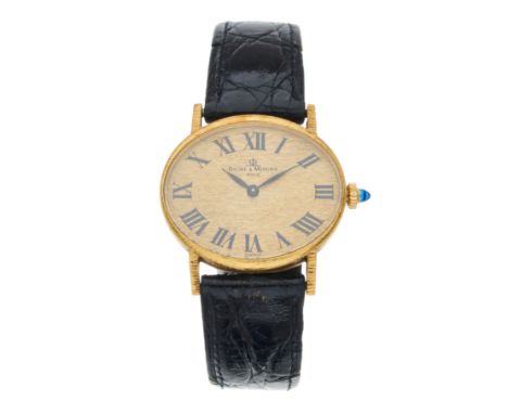 Baume & Mercier, an 18ct gold wrist watch, reference 37062, signed manual wind movement, serial 410428, 31mm excluding the cr