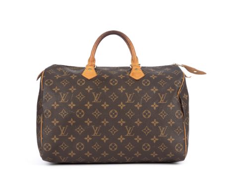Louis Vuitton, a monogram Speedy 35 handbag, featuring the maker's monogram coated canvas exterior with natural tan leather p