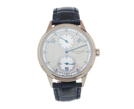 Patek Philippe, an 18ct gold Annual Calendar Regulator wrist watch, circa 2014, reference 5235G, signed automatic movement ca