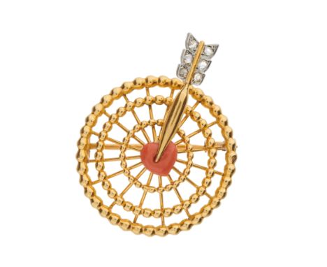 Cartier, a mid 20th century 18ct gold and platinum target brooch, with carved coral heart centre, pierced by a rose-cut diamo