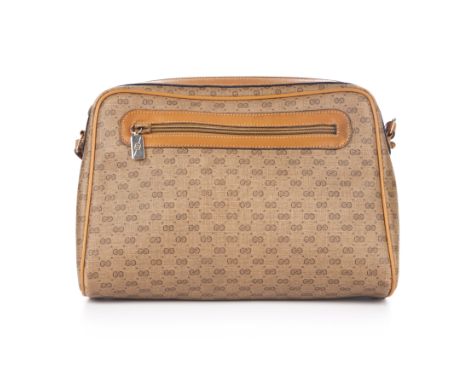 Gucci, a vintage Front Pocket crossbody handbag, crafted from the maker's micro monogram coated canvas exterior with tan leat