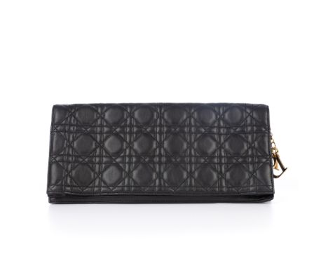 Christian Dior, a black leather Cannage fold-over clutch, featuring the maker's signature quilted pattern throughout, hanging