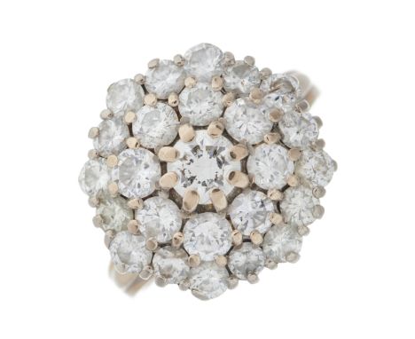 An 18ct gold brilliant-cut diamond floral cluster ring, with openwork shoulders, estimated total diamond weight 3ct, predomin