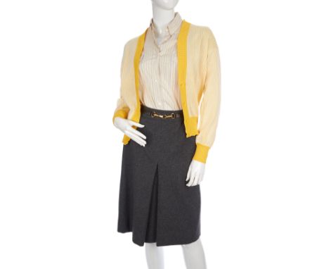 A ladies three-piece outfit, to include a grey wool pencil skirt by Celine, a yellow cotton cardigan by Yves Saint Laurent, t