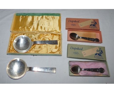 A pair of plated decorative spoons with large bowls and tapering handles, and two Swedish Christening spoons, K and EC C9, 19