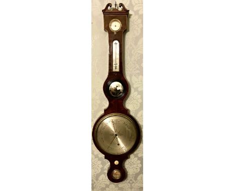 A George III mahogany and satinwood strung banjo barometer by A Donegan, circa 1820, swans neck broken pediment with an urn s