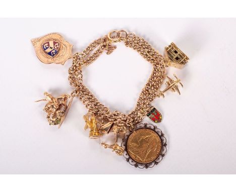 A double chain charm bracelet in rose-yellow metal stamped 9ct 375, linked to 8 charms. The charms include an unmarked yellow