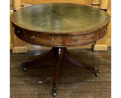 A Regency and later mahogany and leather inlay drum table, circa 1810 with later additional renewals, circular top and four f