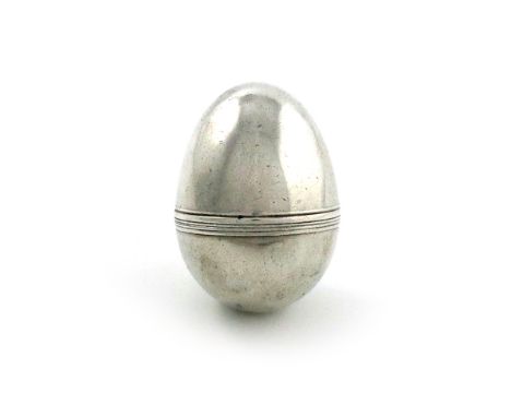 A George III silver nutmeg grater, unmarked, circa 1800, plain egg form, screw-off cover, the interior with a steel grater, l