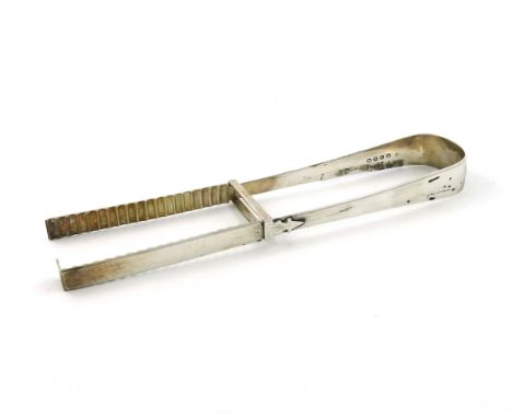 A pair of George III silver asparagus tongs, probably by Eley and Fearn, London 1805, plain spring form, length 26.3cm, appro