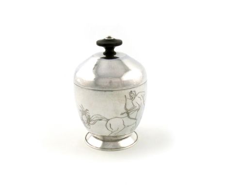 By Aileen Faul, an Art Deco silver caddy, London 1937, tapering circular form, engraved with a crab (Cancer) nipping the tail