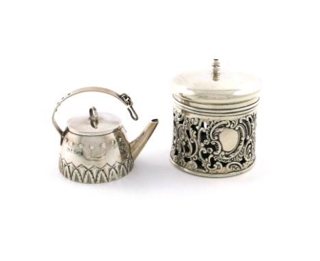 A late-Victorian silver string box, by Levi and Salaman, Birmingham 1900, cylindrical form, pierced and embossed foliate scro
