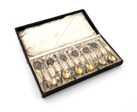 A set of twelve late-19th century Russian silver-gilt and enamel teaspoons, by Johann Victor Aarne, assay master A. Skovronsk