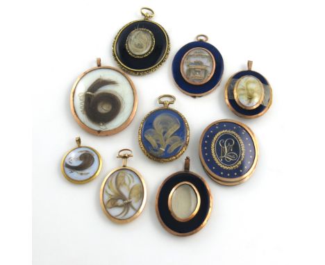 λA collection of nine late 18th / early 19th century locket / portrait miniature frames, gilt metal and silver-gilt, oval for