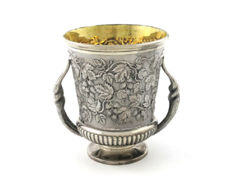 A George III silver two-handled beer cup, by Paul Storr, London 1819, campana form, chased with trailing hops, above part-flu
