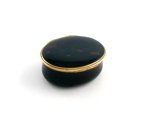 An early 19th century gold-mounted bloodstone snuff box, by La Veuve Lefrerre, Paris, oval form, the base formed as single pi