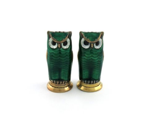A pair of Norwegian silver-gilt and enamel novelty owl pepper pots, by David Andersen, modelled in standing positions, with  